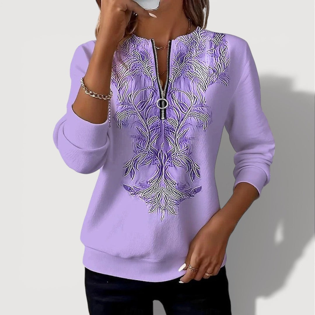 GENIEVA – EMBROIDERED ZIP TOP